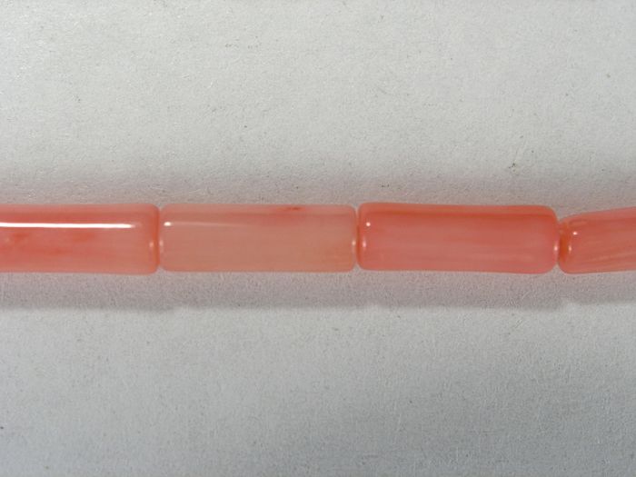 Бусина из коралла розового, облагороженного, фигурная, 3x9 мм (цилиндр, гладкая)