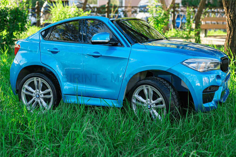 Детский двухместный электромобиль "BMW X6M" JJ2199 12V