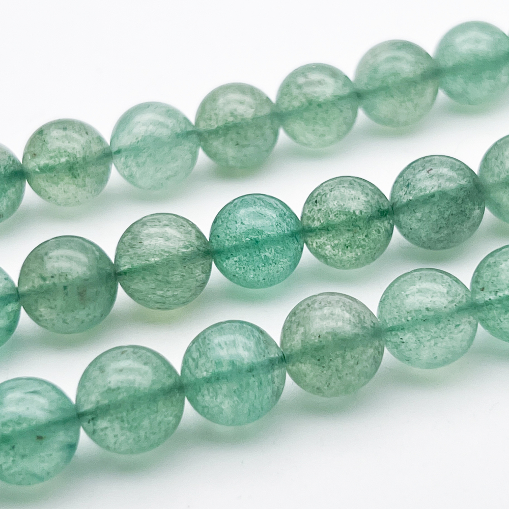 Авантюрин бусины (кварц с фукситом), диаметр около 10,6-10,8 мм, цена за 9 шт (1/4 нити)