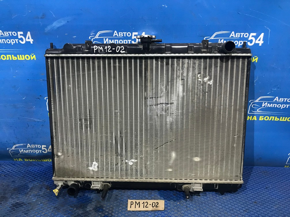 Радиатор двигателя NISSAN LIBERTY 1999