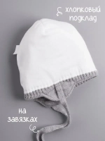 Шапка для девочки на завязках на осень