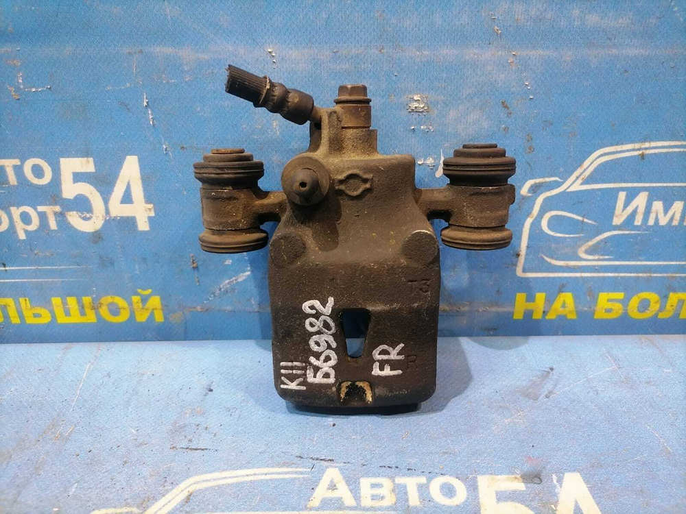 Суппорт тормозной передний правый NISSAN MARCH 1997-2002