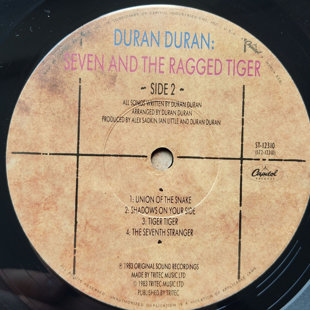 Винтажная виниловая пластинка LP Duran Duran Seven And The Ragged Tiger (USA 1983) Union Of The Snake
