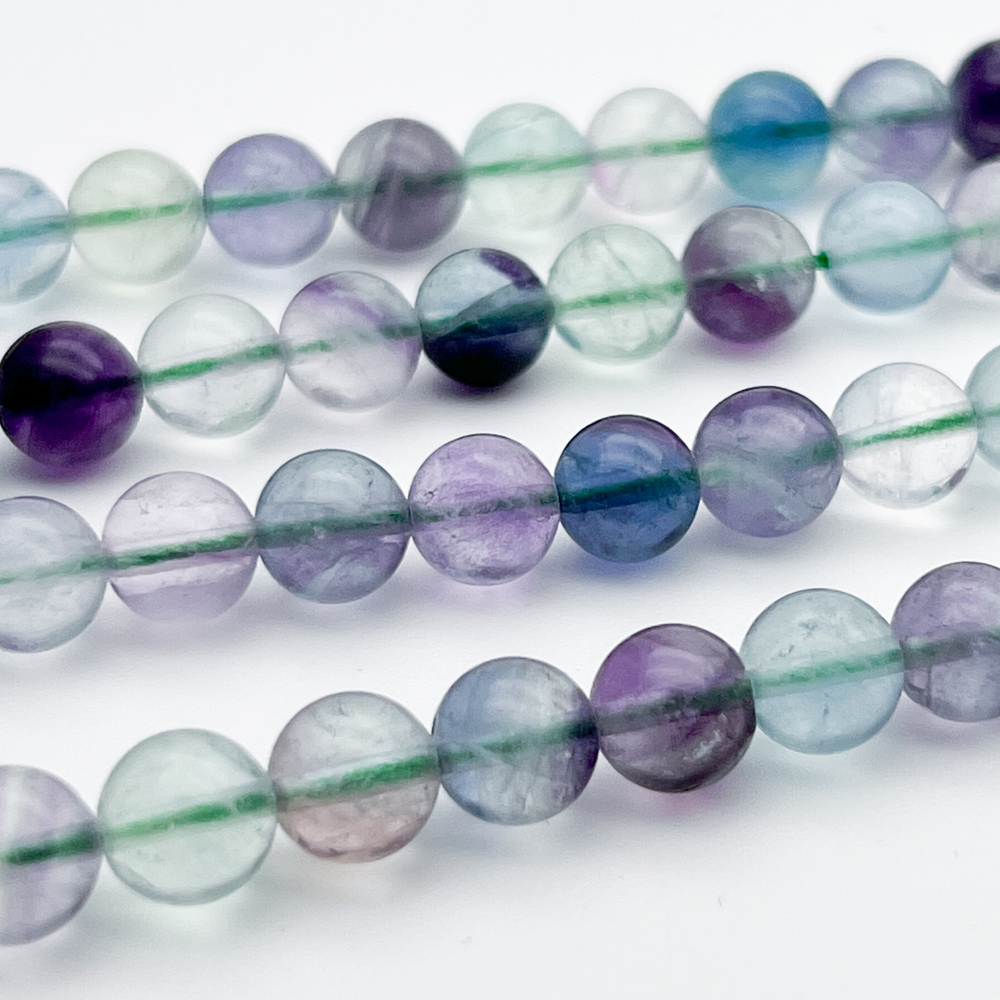 Флюорит, диаметр 8,1-8,3 мм, цена за 12 шт (1/4 нити)