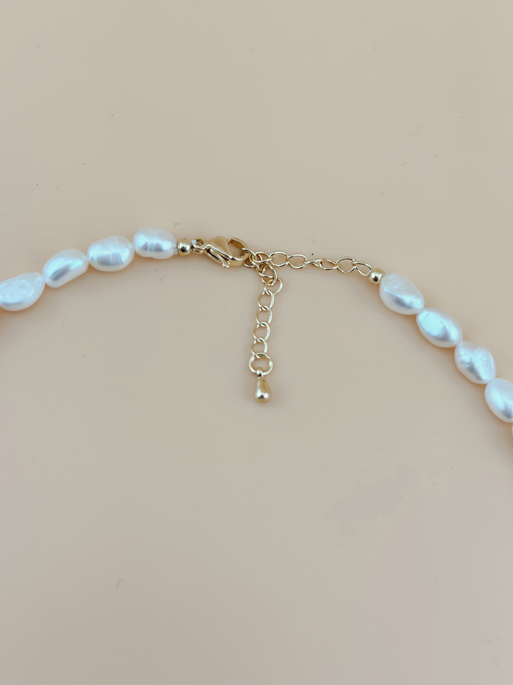 Колье жемчужное с золотым сердцем