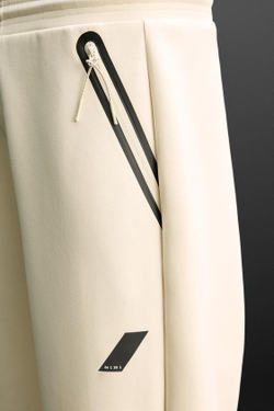 ZARA ДЖОГГЕРЫ ИЗ ВЫСОКОТЕХНОЛОГИЧНОЙ ТКАНИ С МОЛНИЯМИ, ЭКРЮ