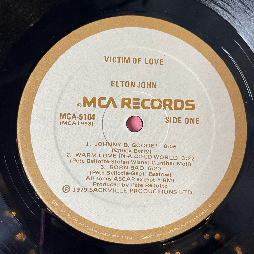 Винтажная виниловая пластинка LP Elton John Victim Of Love (Canada 1979)