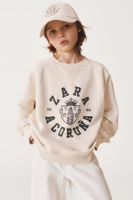 ZARA ТОЛСТОВКА В СТИЛЕ ПРЕППИ 50TH ANNIVERSARY, ЭКРЮ