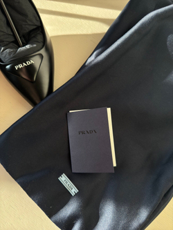 Слингбэки Prada