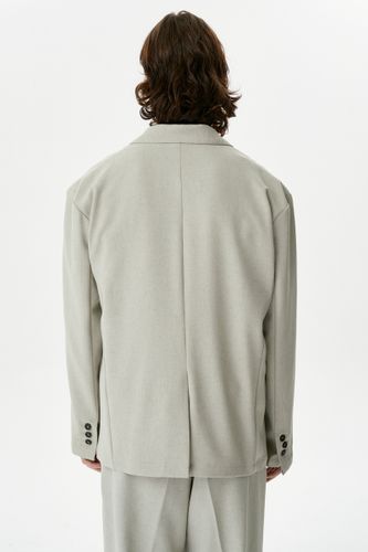 Бежево-серый брючный костюм Copper