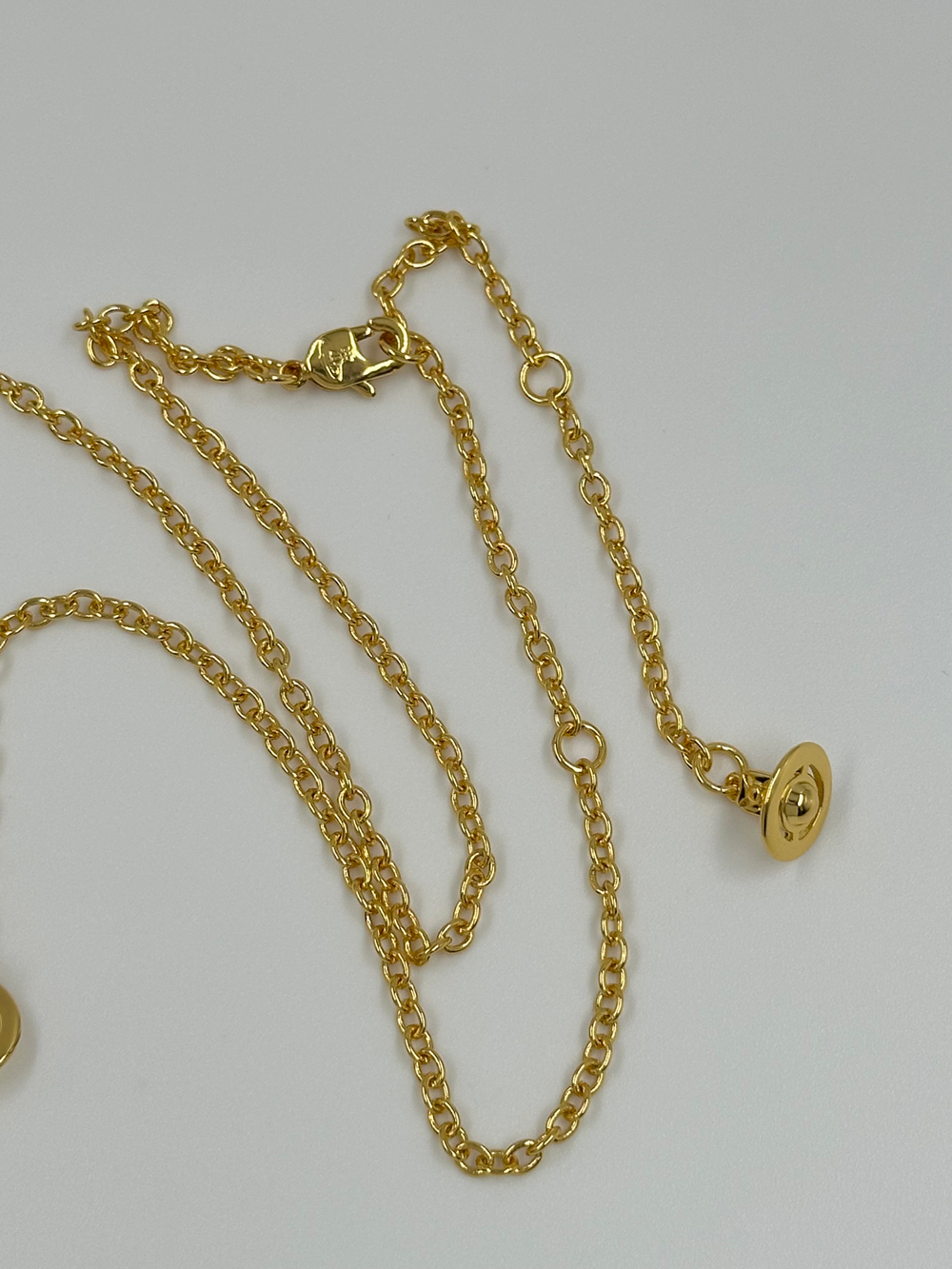 Кулон в виде парфюма Boudoir Vivienne Westwood