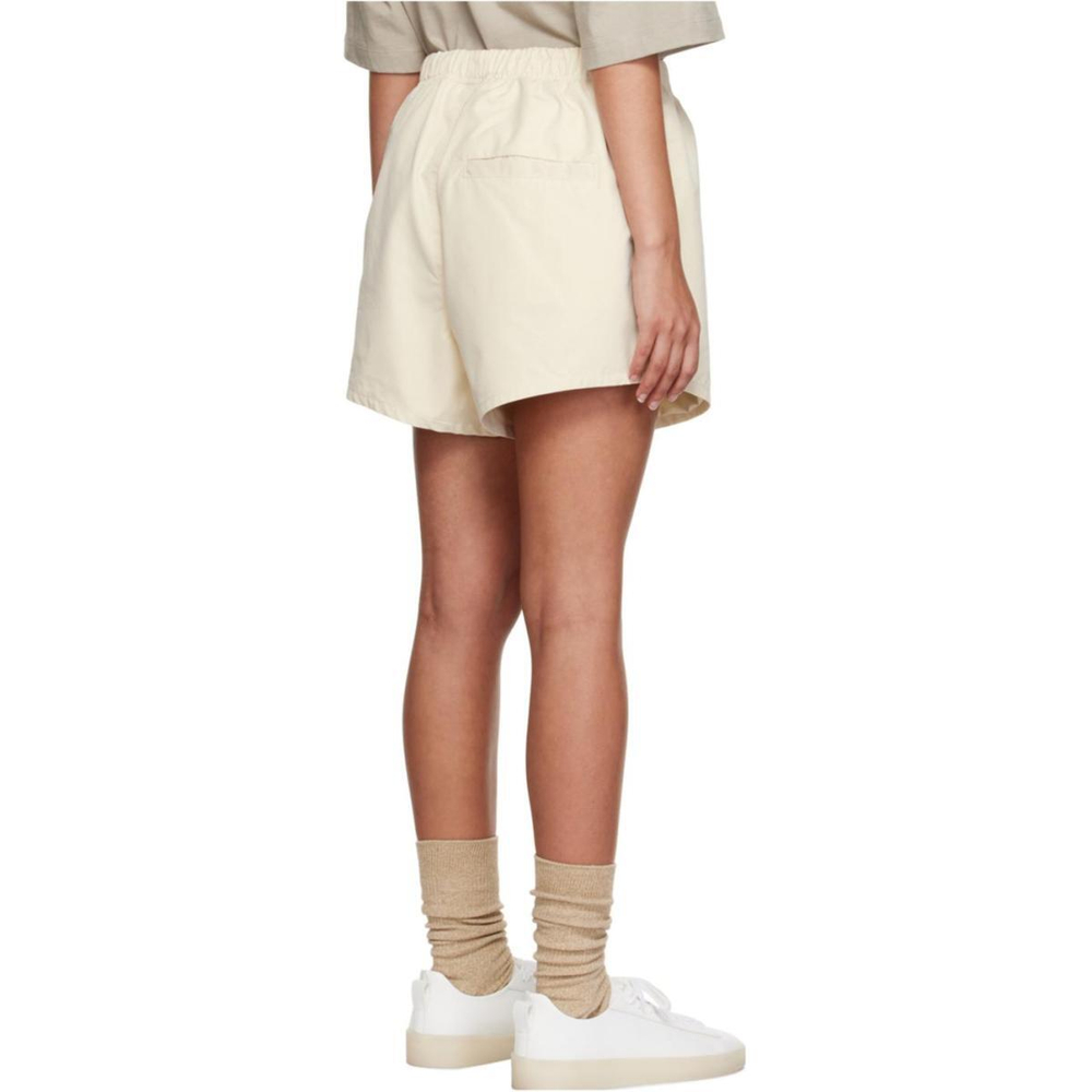 Шорты Fear of God Essentials FW22 Nylon Running Shorts Egg shell Logo, FOG-FW22-0792