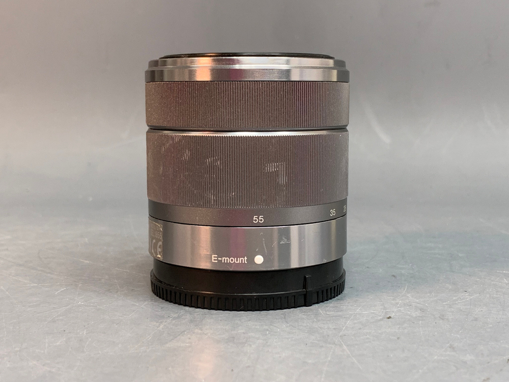 Sony 18-55mm 3.5-5.6 E OSS царапины на передней линзе
