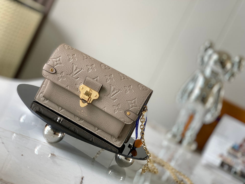Louis Vuitton Vavin Chain Wallet