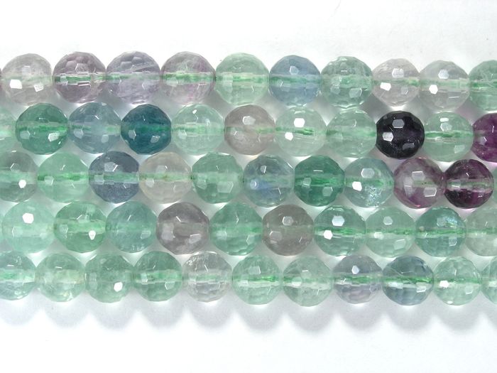 Нить бусин из флюорита зеленого, фигурные, 8 мм (шар, граненые)
