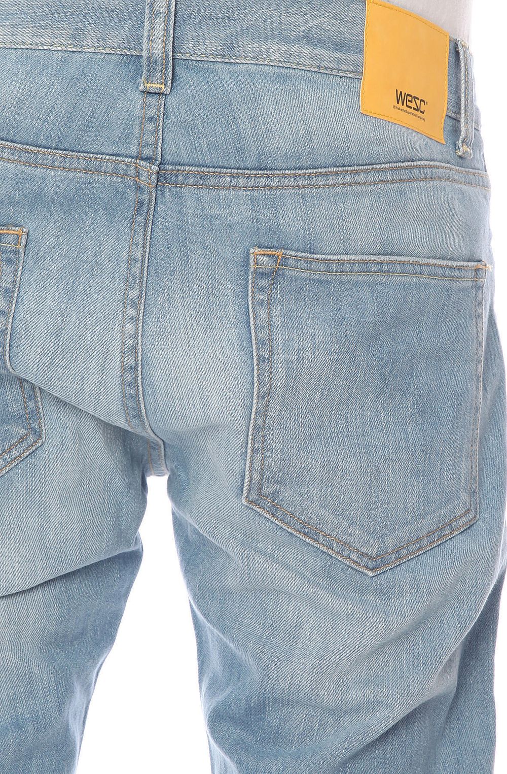 Джинсы скинни голубые фото сзади