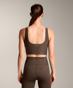 Oysho Спортивный бюстгальтер средней поддержки Perfect-adapt с чашками, темно-коричневый