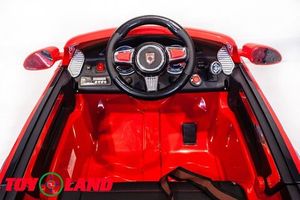Детский электромобиль Toyland Porsche Cayenne красный