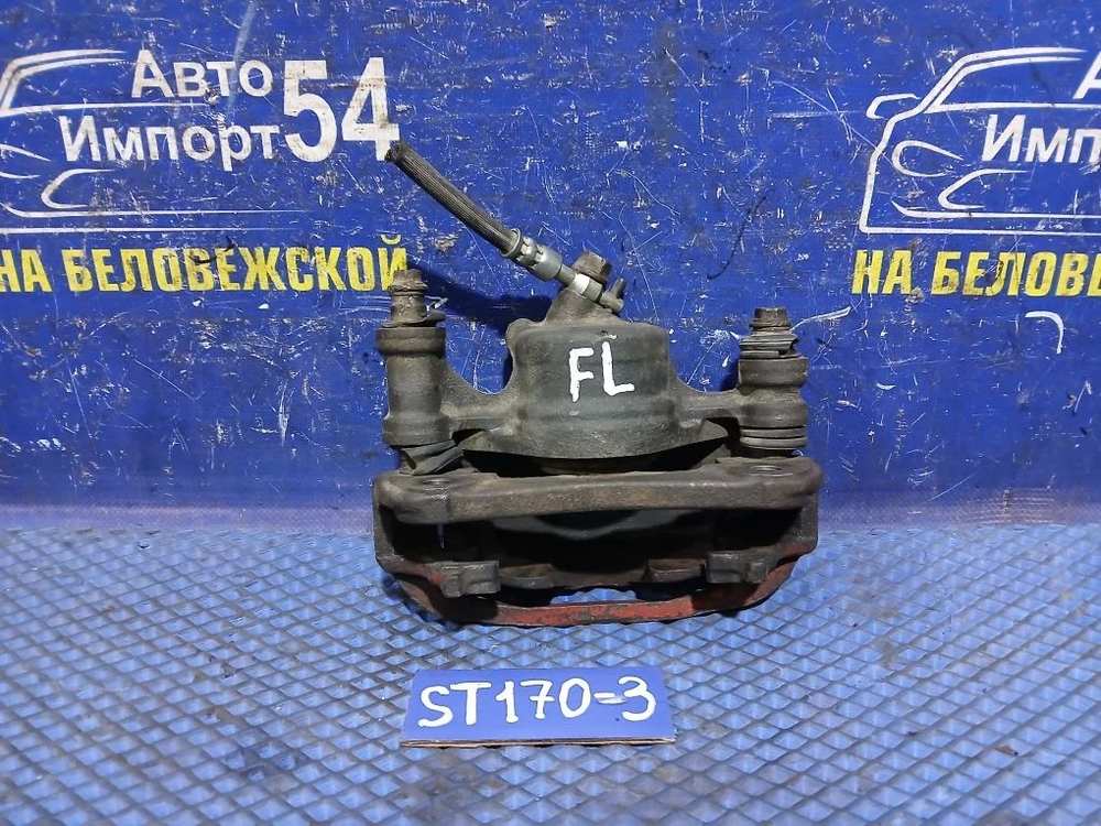 Суппорт тормозной передний левый TOYOTA CORONA 1990