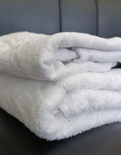 Ветошь белая махровая 100% ХБ (полотенца цельные 70x140 см) в тюках по 10 кг