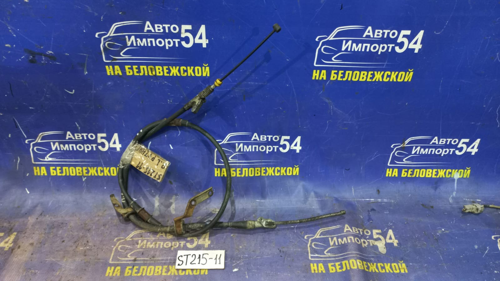 Трос ручника левый TOYOTA CALDINA 1999