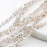 Бусина Треугольник, стекло, цвет песочный АВ, размер около 3*4 мм, цена за нить 34 см