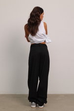 Брюки широкого кроя