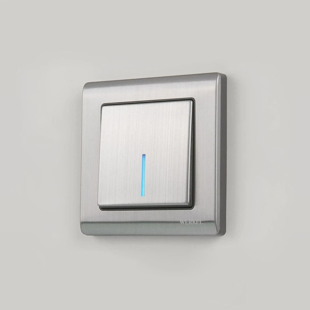 Выключатель одноклавишный с подсветкой (никель рифленый глянцевый) W1110102