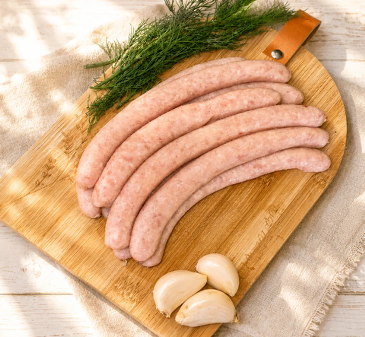 Фотография Колбаски из курицы /500 гр купить в магазине Афлора