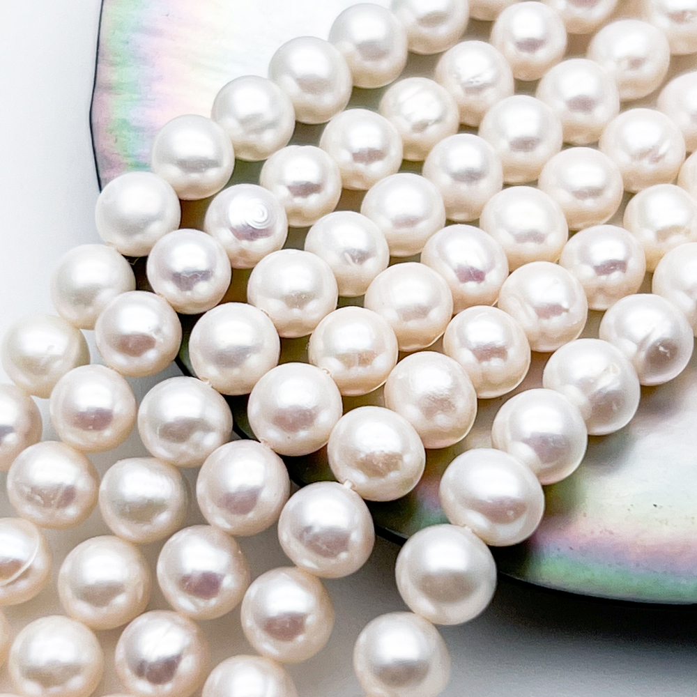 Жемчуг бусины, размер около 6-6,5 мм, цена за отрезок 9,5 см (1/4 нити)