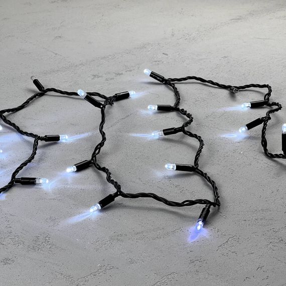 Светодиодная гирлянда с колпачком 100 холодных белых LED ламп 10 м., мерцание, 24В., черный провод ПВХ, IP65, LTC (PST100BLWCAP-11-1W)