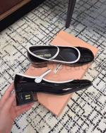 Женские туфли Miu Miu черного цвета с круглым носиком