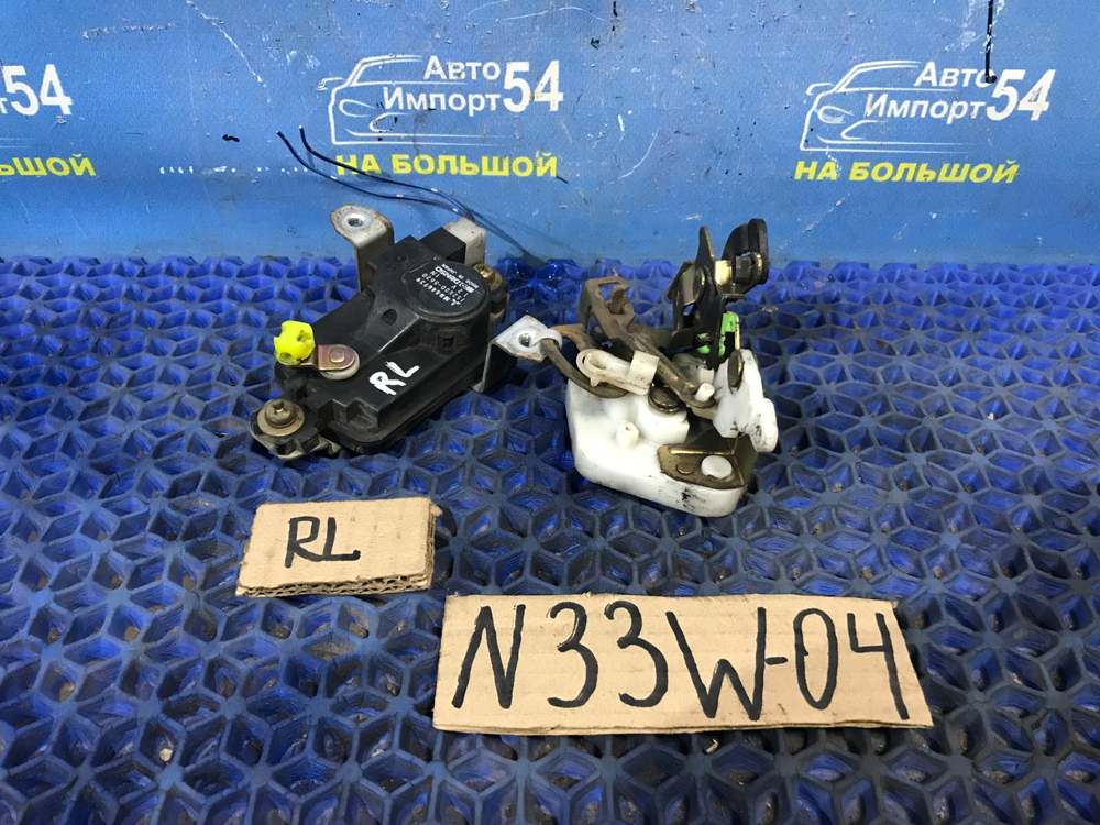 Замок двери задней левой MITSUBISHI CHARIOT 1994