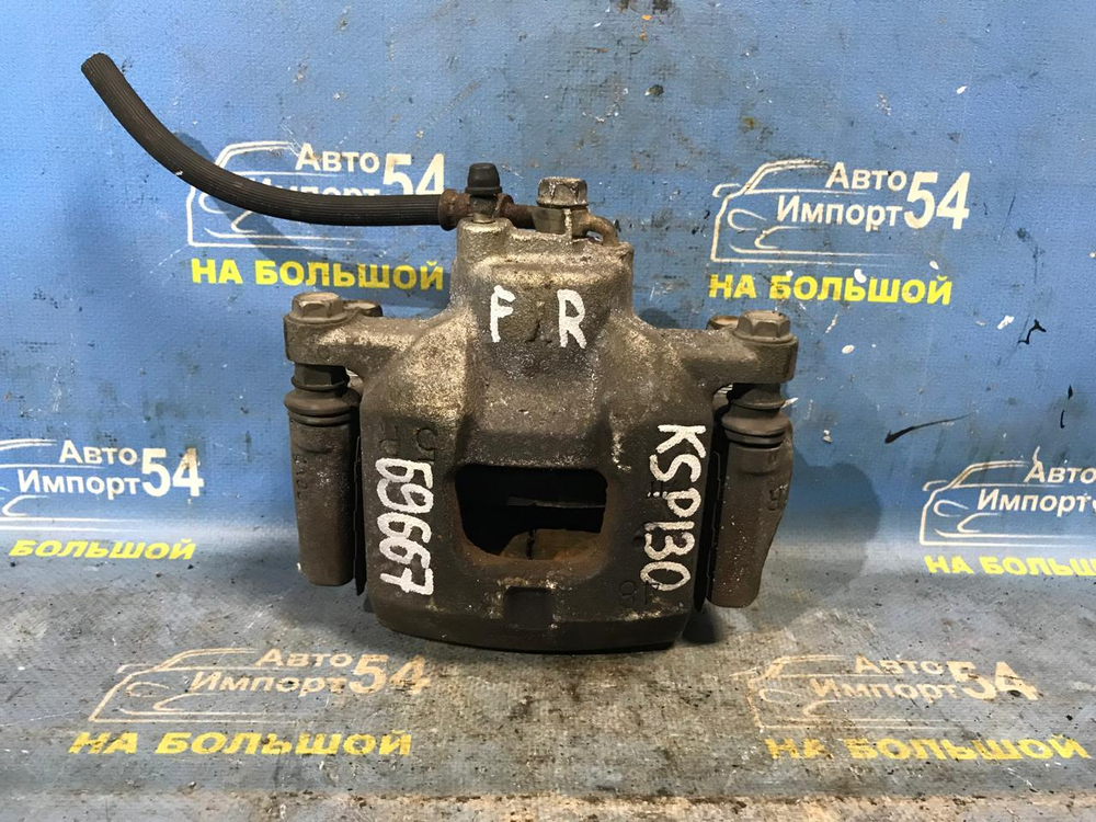 Суппорт тормозной передний правый TOYOTA VITZ 2010-2014