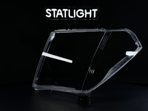 Левое стекло фары Nissan Navara Pathfinder R51 2004-2010