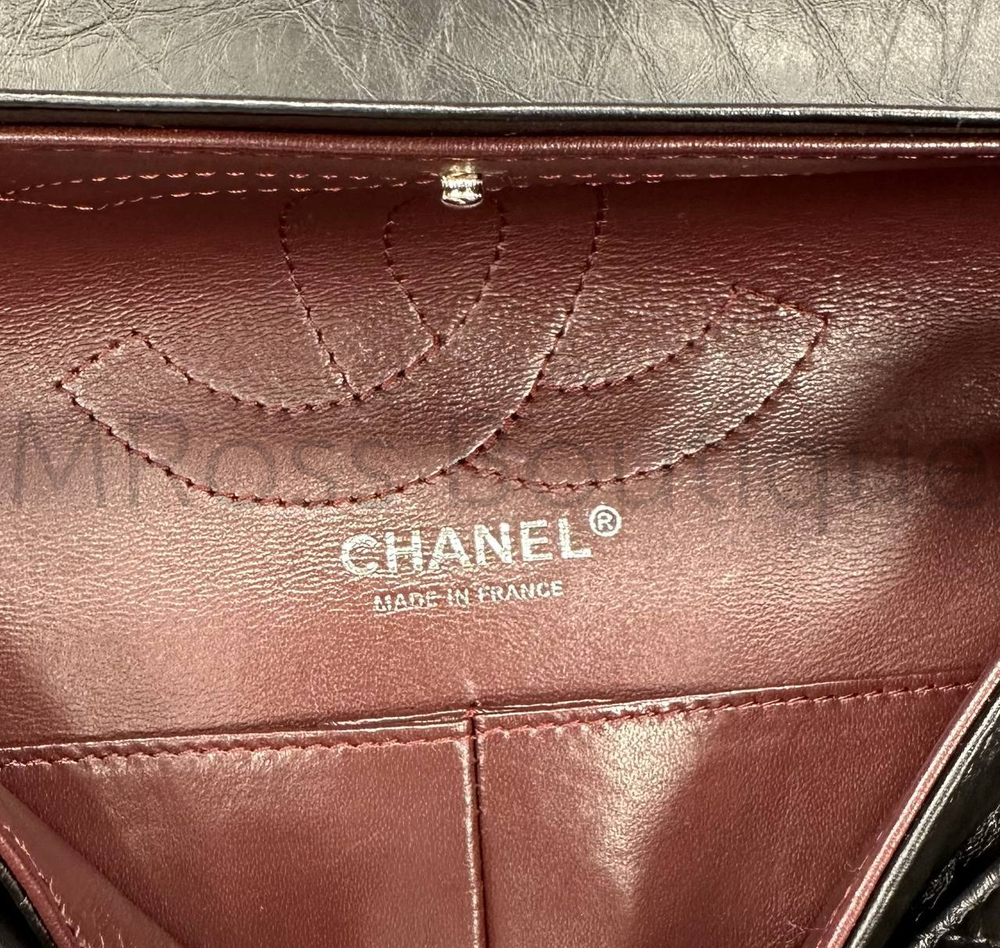 Черная сумка Chanel 2.55