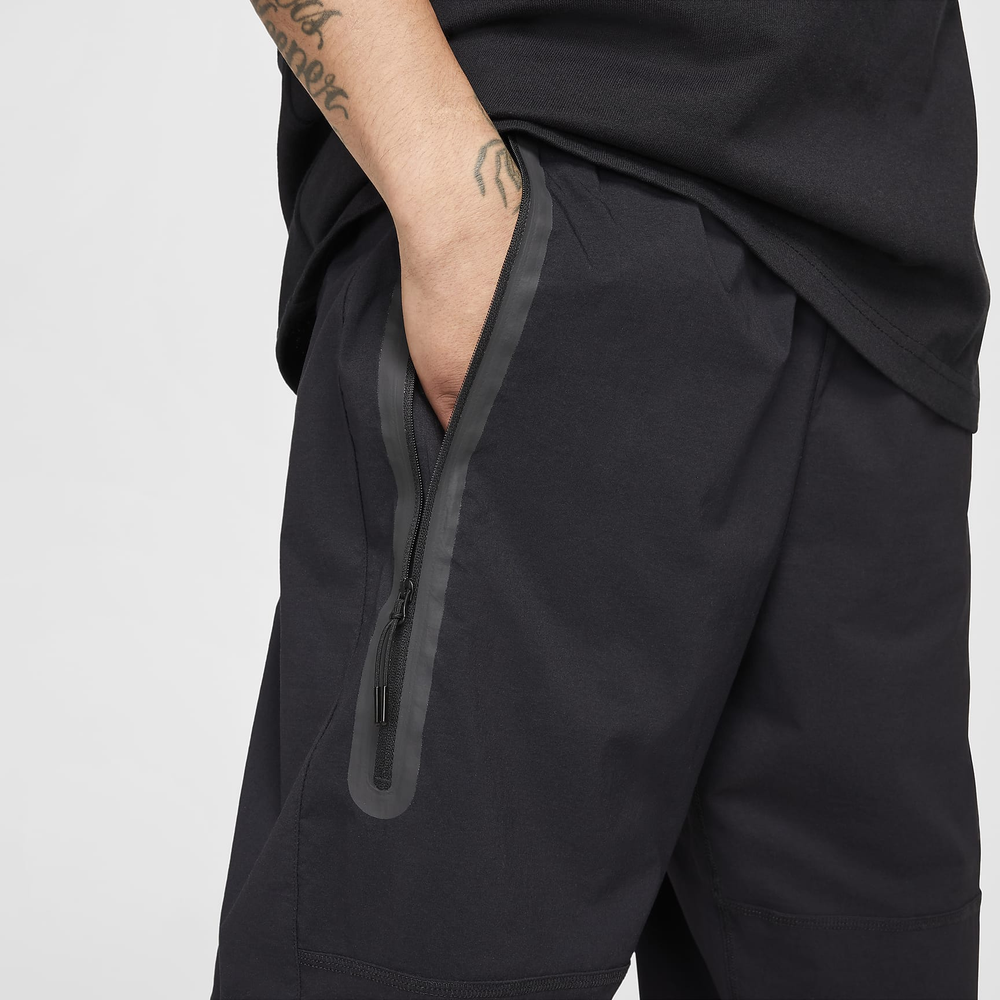 HM7158-010 Брюки M NK TCH WVN PANT OS