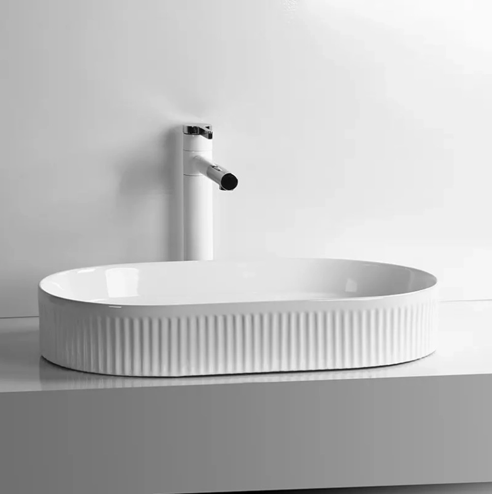 Раковина CR8009 накладная, белая, овальная 580х360х100 Ceruttispa