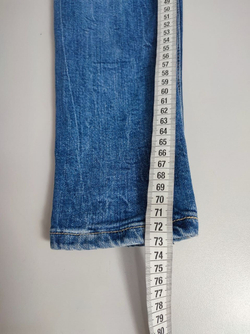 Джинсы с рваным эффектом 42 размер