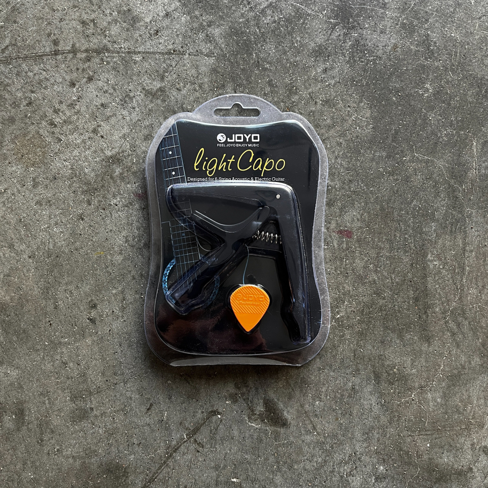 Каподастр черный Joyo