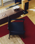 Кресло Jan из переработанной кожи черного цвета и ясеня в черном цвете