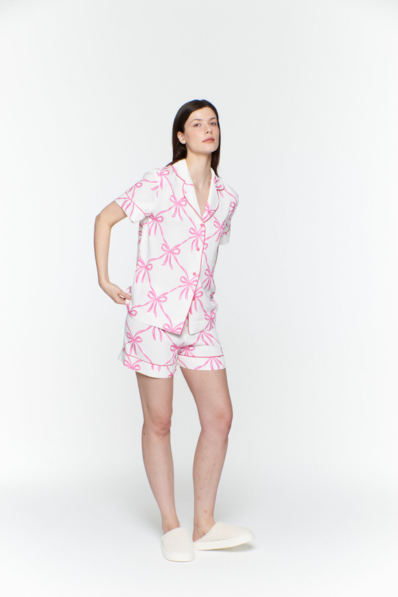 Блуза из вискозы с кантом и бантами