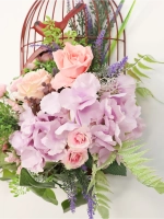 Композиция настенная с цветами в металлической клетке