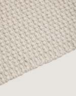 Ковер Mascarell из хлопка и полиэстера белого цвета 70 x 140 см