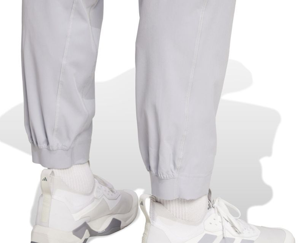 Мужские теннисные штаны Adidas Trening Essential Woven - ореол серебристый/черный