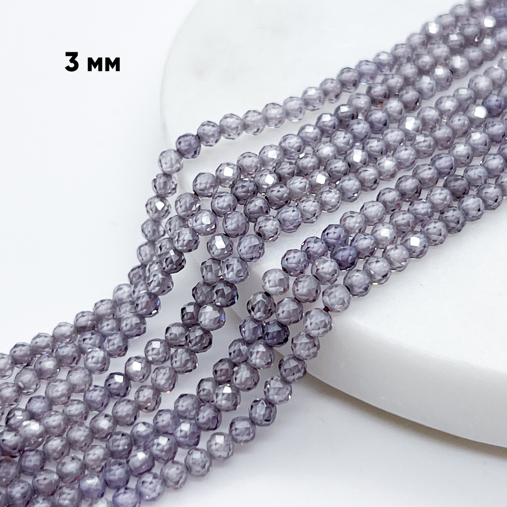 Фианит (кубический цирконий), цвет лиловый, размер 3 мм, цена за нить около 130 шт (38 см)