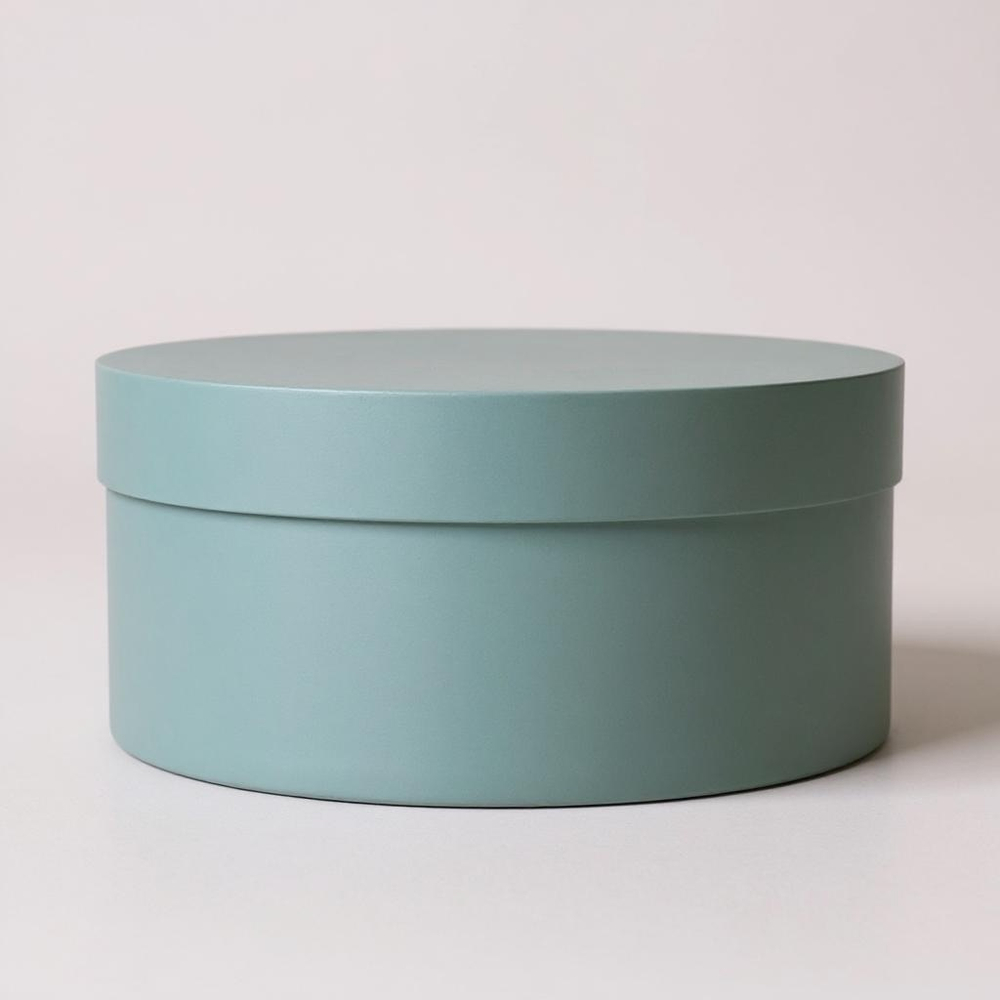 Плотная короткая круглая коробка(без ручек).Цвет: Нежно зеленый.