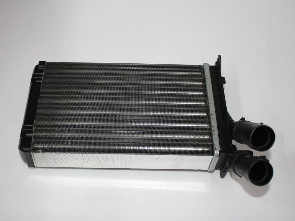 Радиатор отопителя L8101100 Lifan Breez