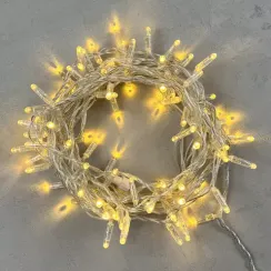 Светодиодная гирлянда с колпачком 100 теплых белых LED ламп 10 м., 24В., прозрачный провод ПВХ, IP65, LTC (PST100CAP-10-1WW)
