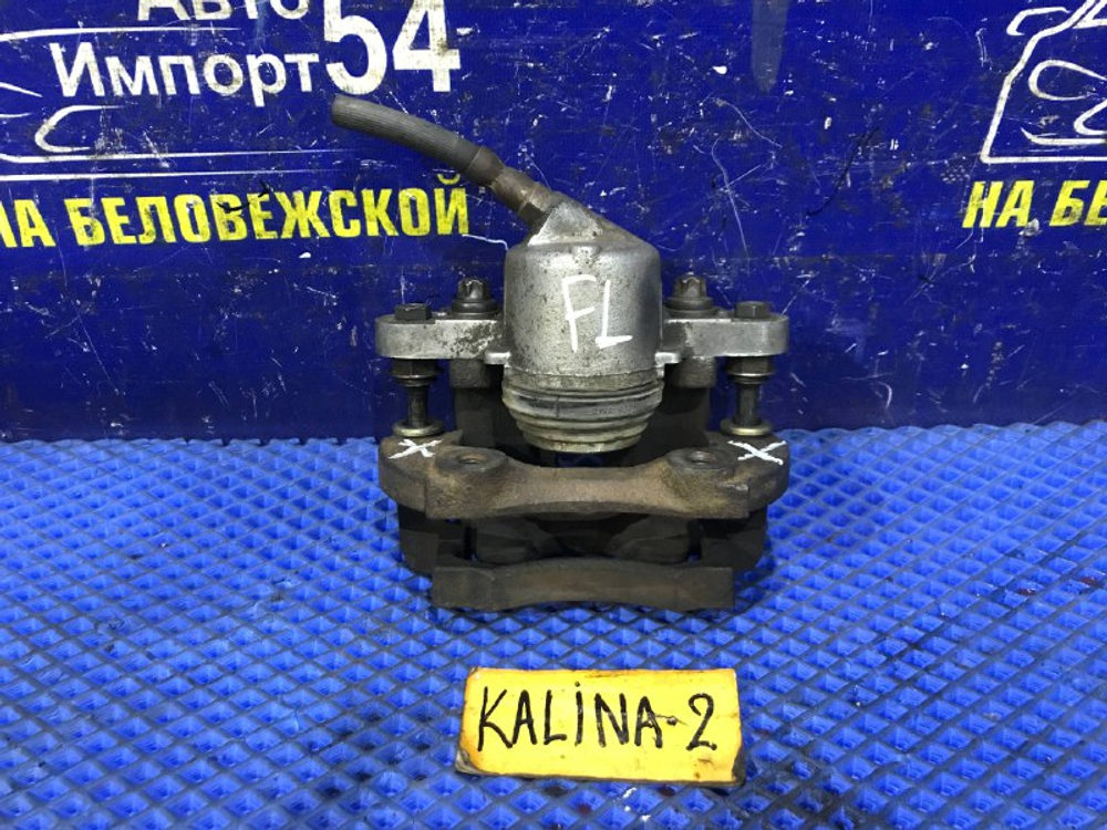 Суппорт тормозной передний левый LADA KALINA 2006